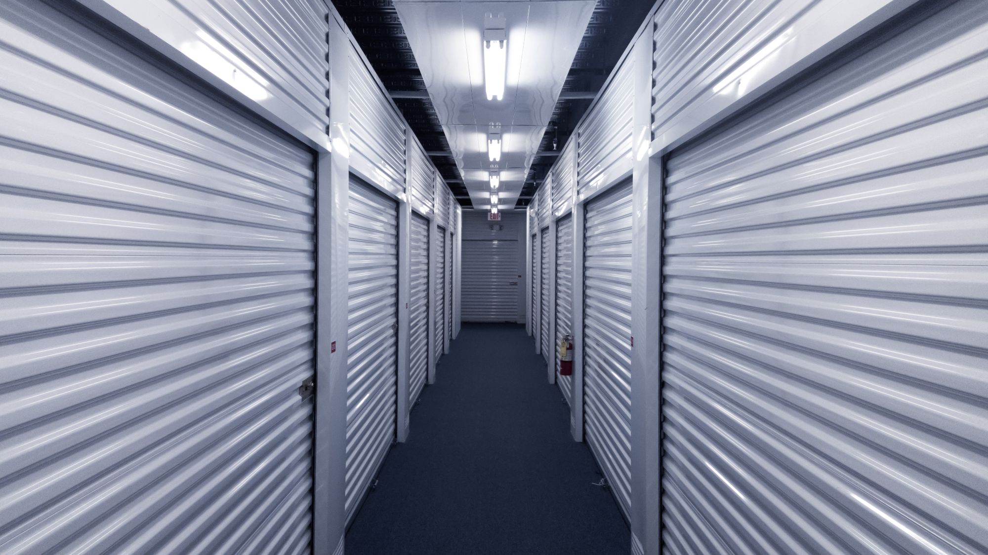 Indoor hallway of self-storage units.